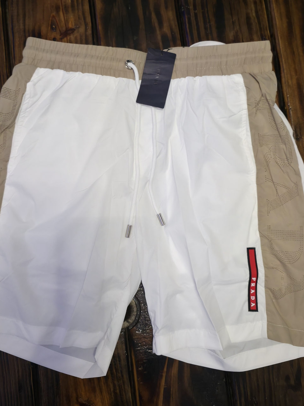 Prada Men’s White and Beige Drawstring Shorts (med-XL)